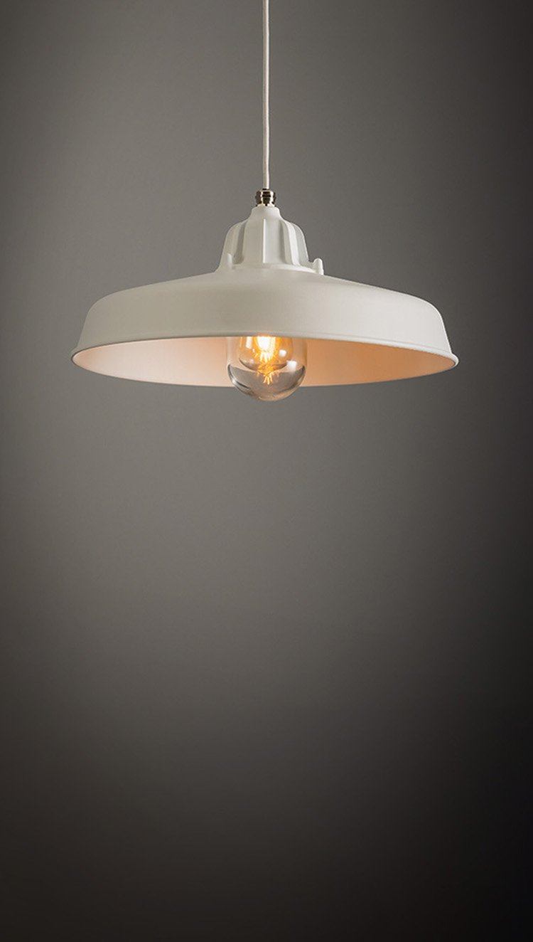 Background image showing sturdy metal light fitting made by J&G Coughtrie